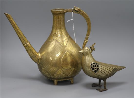 An 18th century brass Mughal ewer and a brass reticulated bird incense burner tallest 18cm